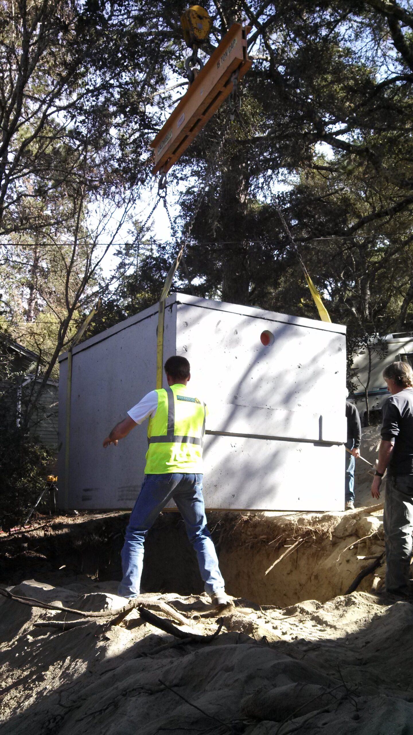 Superior On-Site Solutions technician supervising Hoot septic system installation California