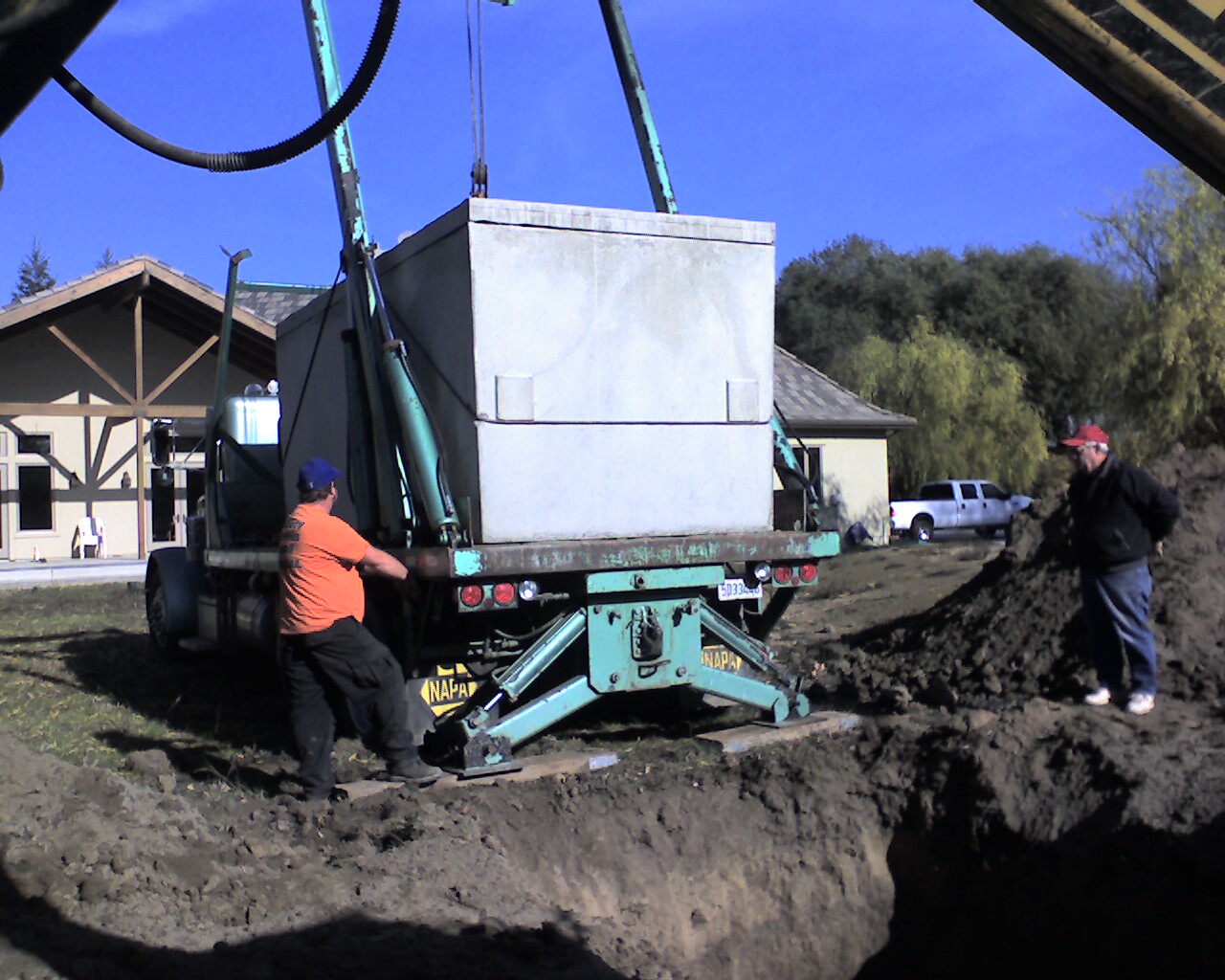 Hoot H600 BNR septic tank arrival on-site Clarksburg mound replacement project