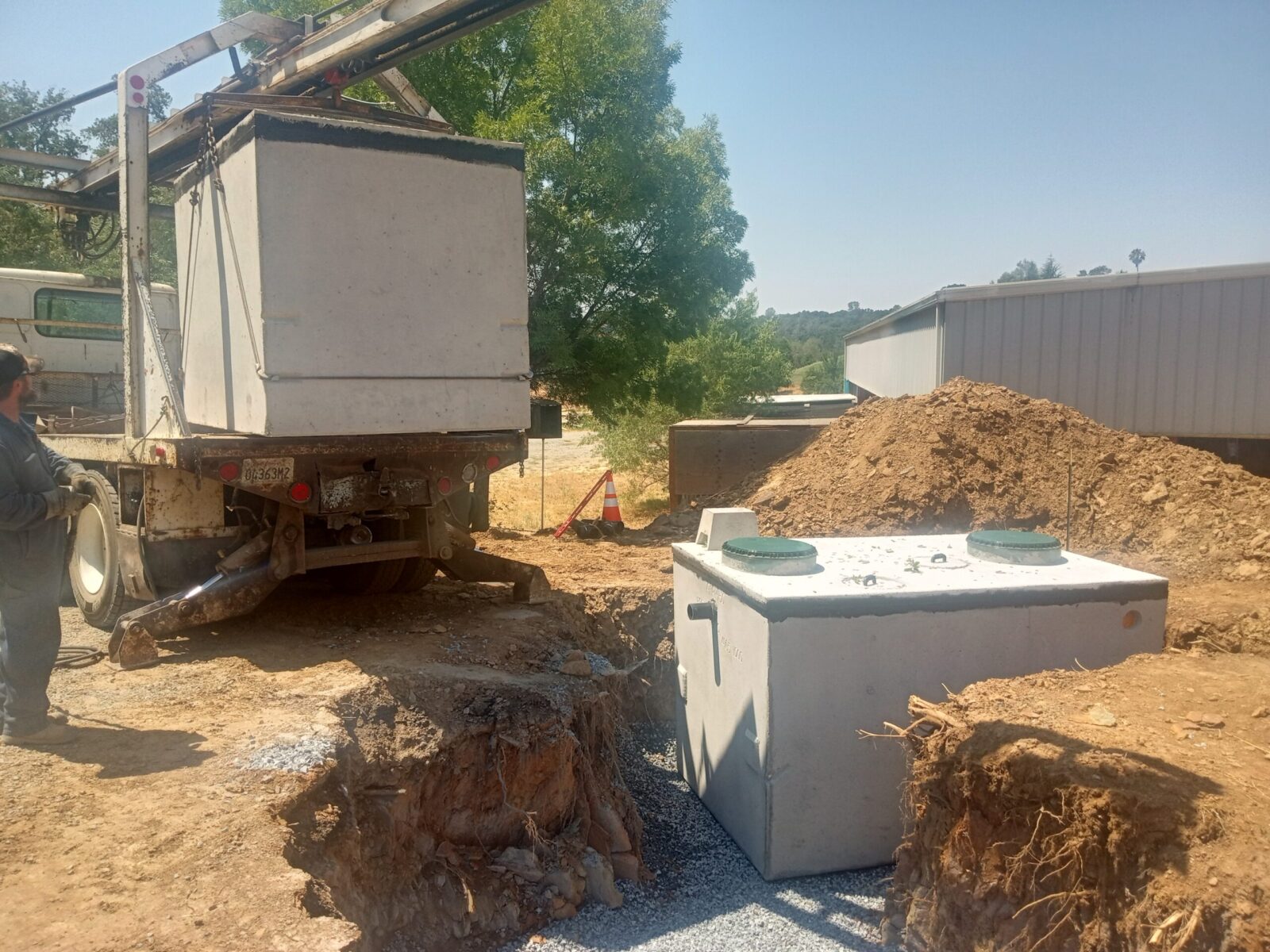 Hoot septic tank delivery and installation by licensed California septic contractor